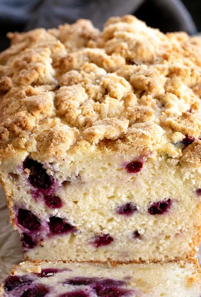 This gluten free blueberry muffin bread is a tender and rich quick bread made with sour cream, packed with fresh blueberries. Crumble topping (sort of) optional.
