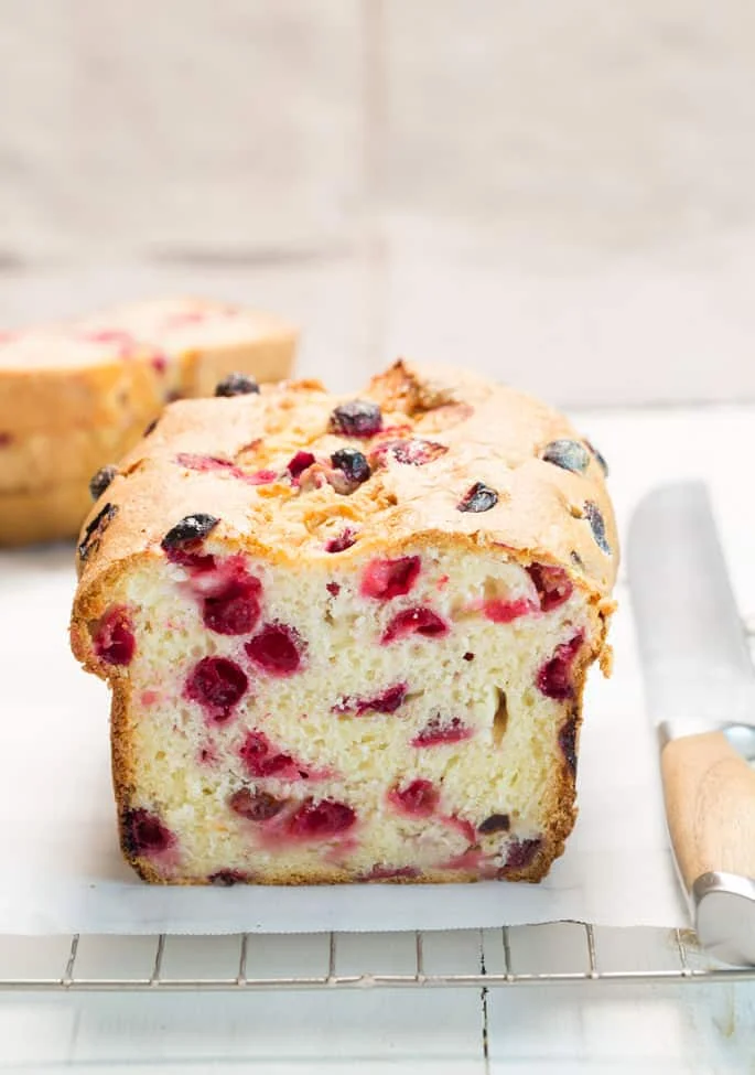 This gluten free cranberry bread is super moist, lightly sweet and only just a bit tart. It's the perfect quick bread for your holiday table.