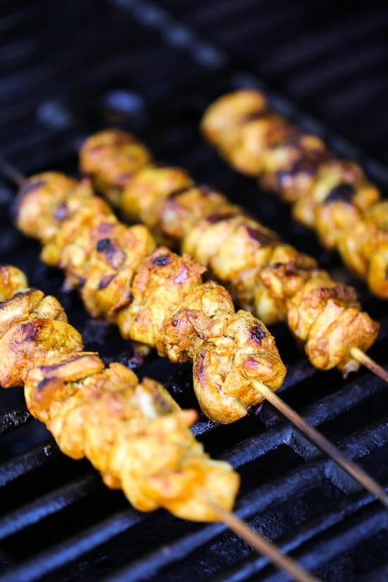 This Mediterranean inspired salad is made with Grilled Chicken Shawarma kebabs served over salad with Feta and Tzatziki.