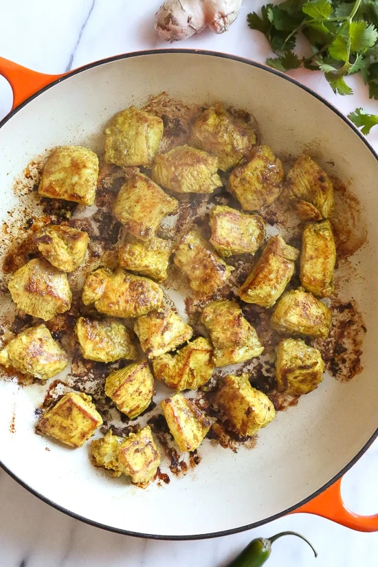 This quick and easy Indian-inspired skillet dish, is a low-carb take on Chicken Biryani, made with riced cauliflower in place of rice. It's also Keto, gluten-free and Whole30 compliant.