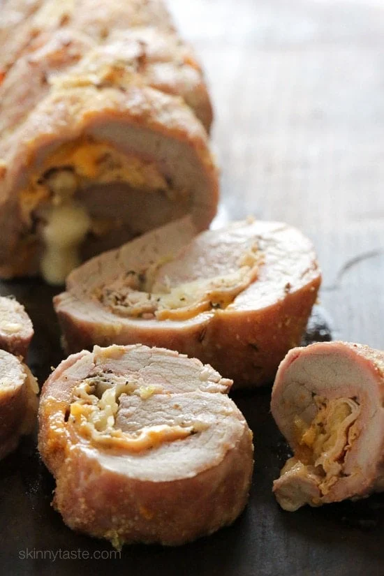 This Reuben Stuffed Pork Tenderloin is stuffed with all the elements of a classic Reuben sandwich – pastrami, sauerkraut, Thousand Island dressing and Swiss cheese!