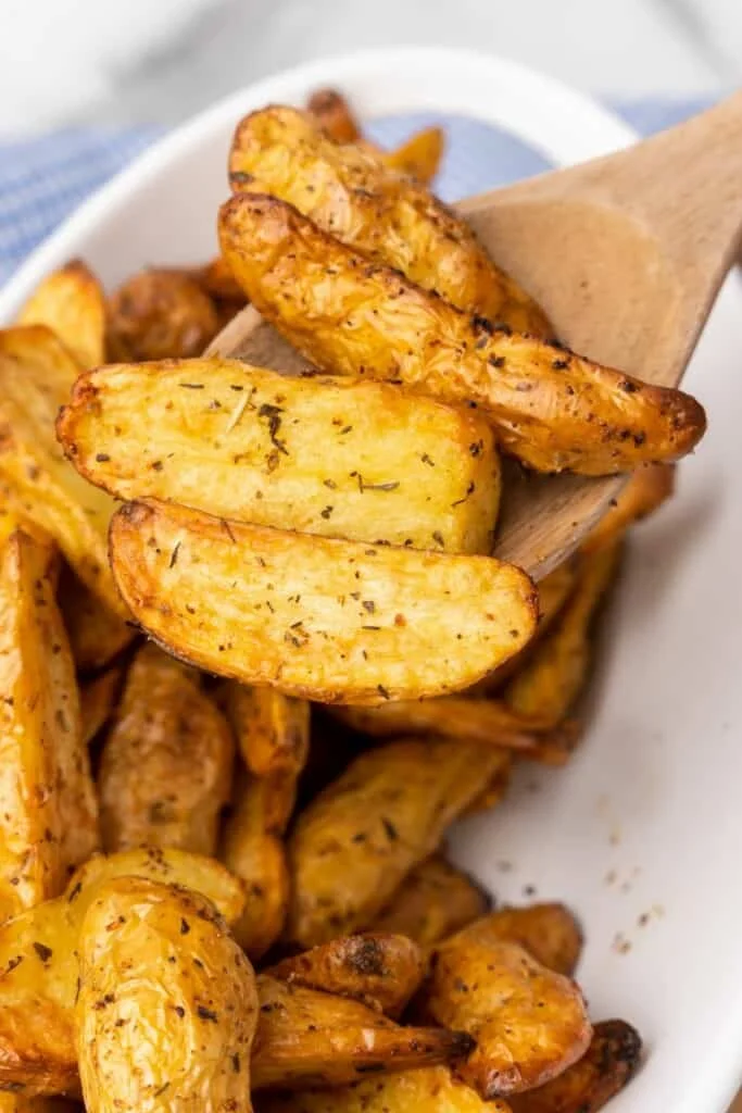 wooden spoon with fingerling potatoes