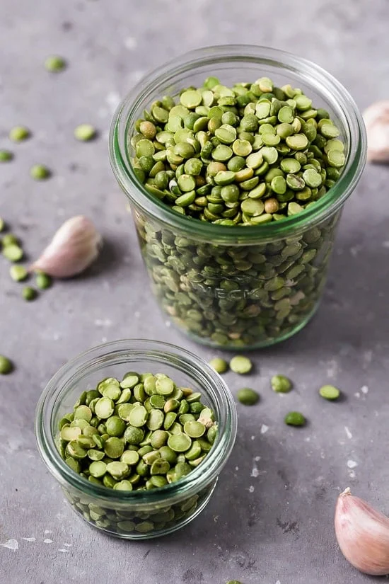 A jar filled with green split peas.