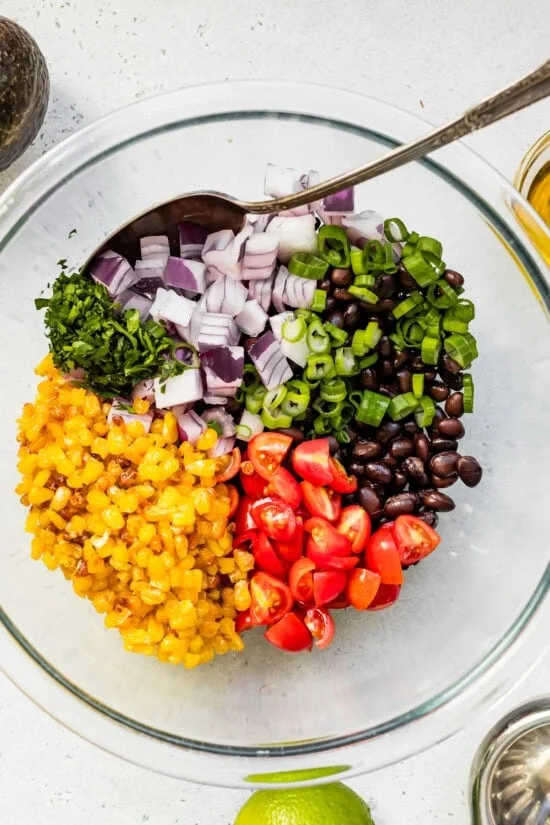 black bean and corn salad ingredients in a bowl