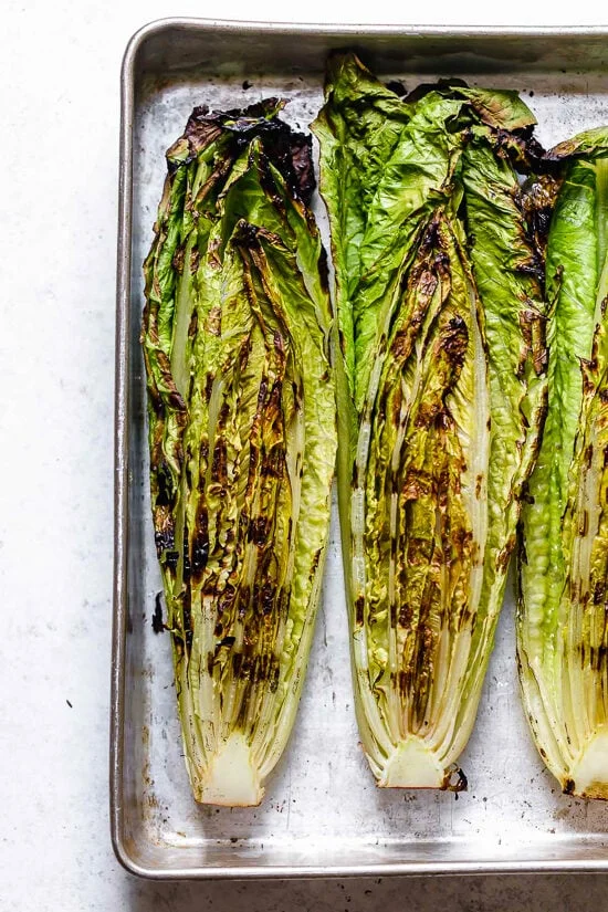 Grilled romaine on sheet pan.