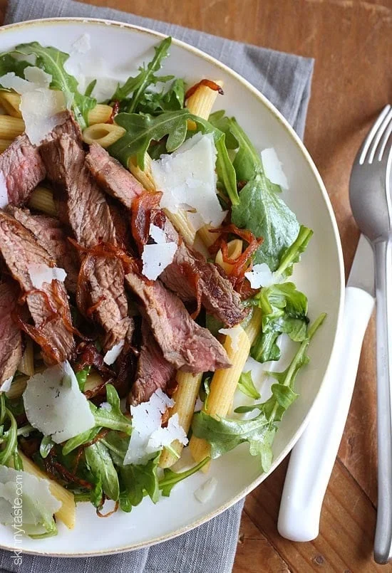 Steak & Caramelized Onions with Arugula and Pasta