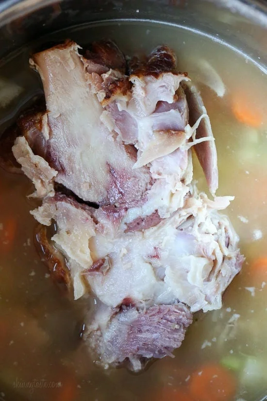 Ham bone in pot of soup