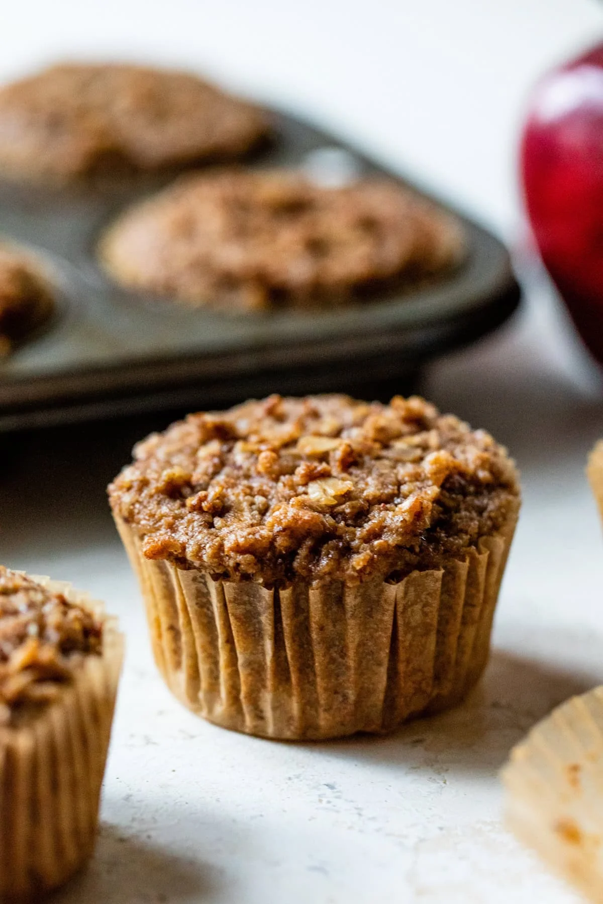 Healthy Apple Muffins on a counter.