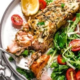 I'm obsessed with this Air Fryer Basil-Parmesan Salmon recipe! Making salmon in the air fryer is quick and easy, and the fish comes out so juicy inside.