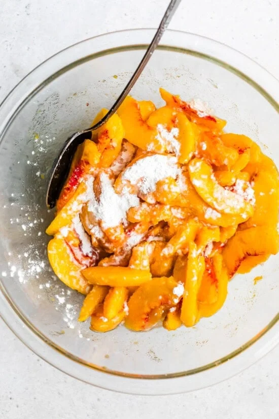 peaches and cornstarch in a bowl