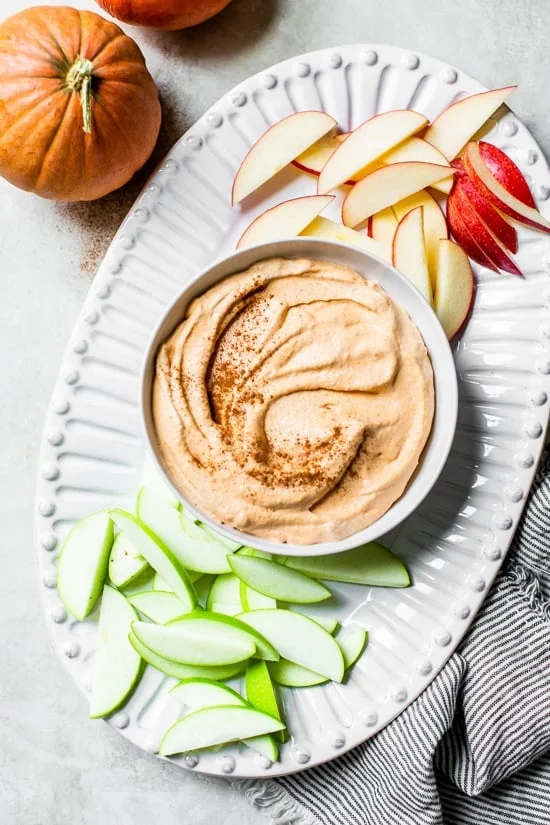 Pumpkin Pie Dip with sliced apples.