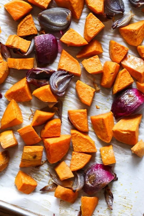 Roasted sweet potatoes are magical in this soup when combined with a squeeze of lime juice. The crushed macadamia nuts on top add texture in every bite!