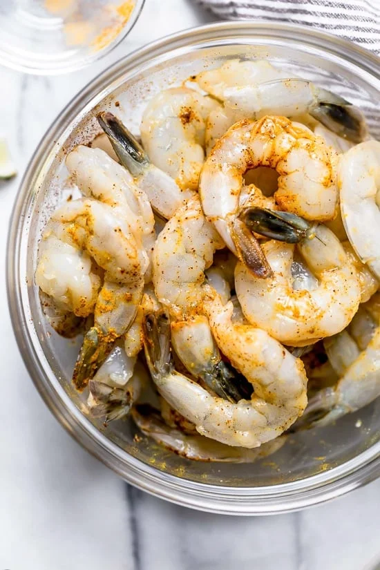 This refreshing Thai-style salad with greens, herbs, veggies and shrimp, all tossed in a delicious cashew dressing, is the perfect one-dish summer dinner.