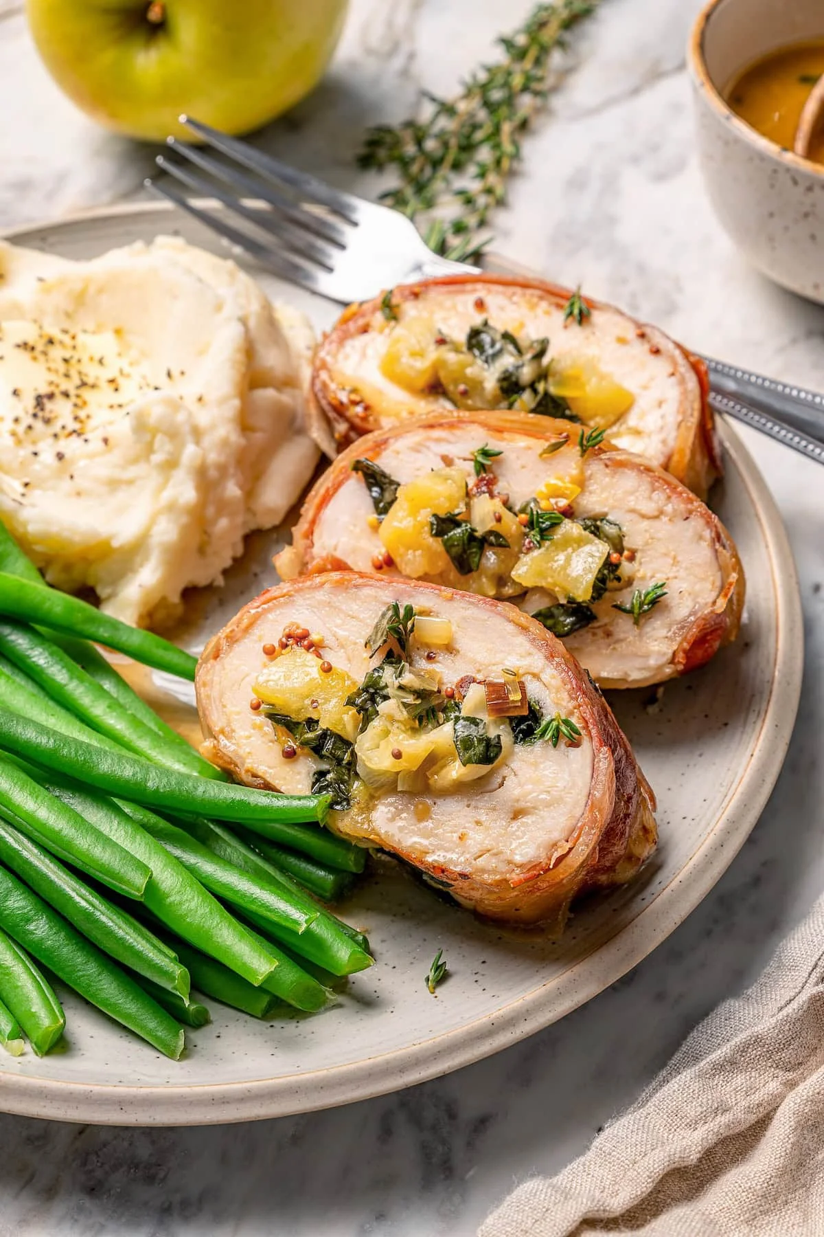 Prosciutto Wrapped Stuffed Turkey Tenderloin Recipe with Apples and Kale