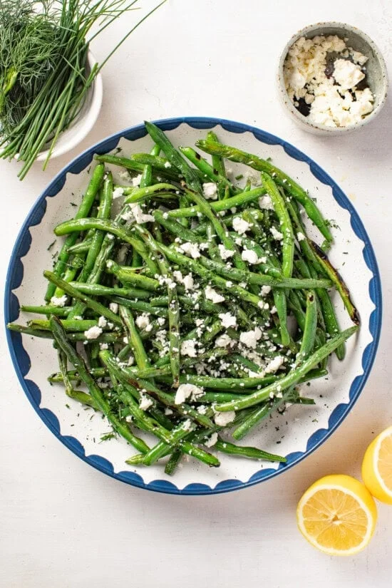 top green beans with fresh herbs and feta