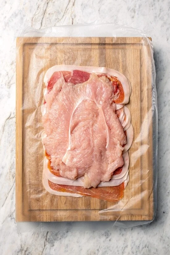 Turkey tenderloin set over layer of prosciutto.